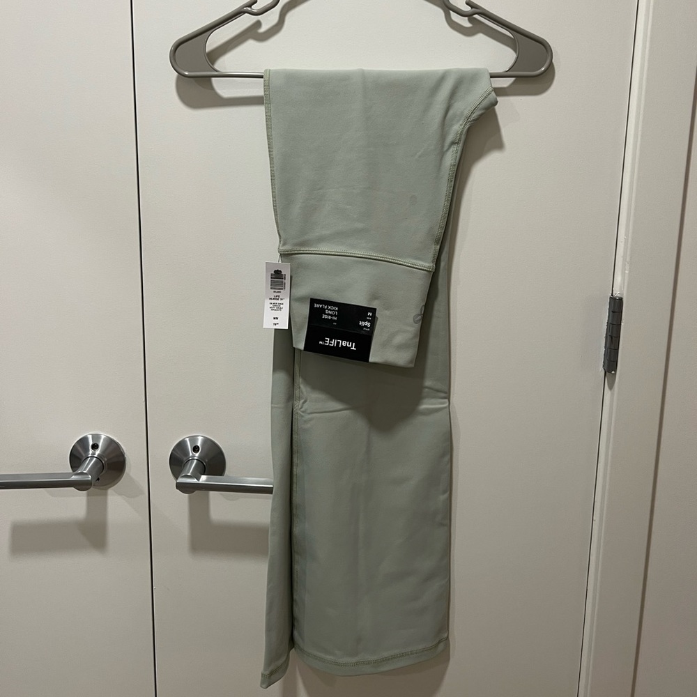 Aritzia TNA high rise long kick flare pants